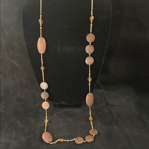 Elegant Gold and Brown Beaded Necklace with matching earrings.